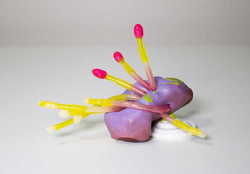 
Small scale sculpture formed with paper clay, breast pump components, plastic and silicone tubing, and beeswax