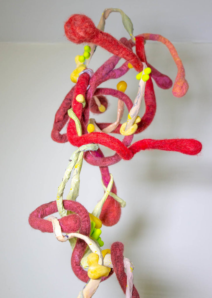 Colorful hanging fiber sculpture by DC area artist Emily Hoxworth Hager